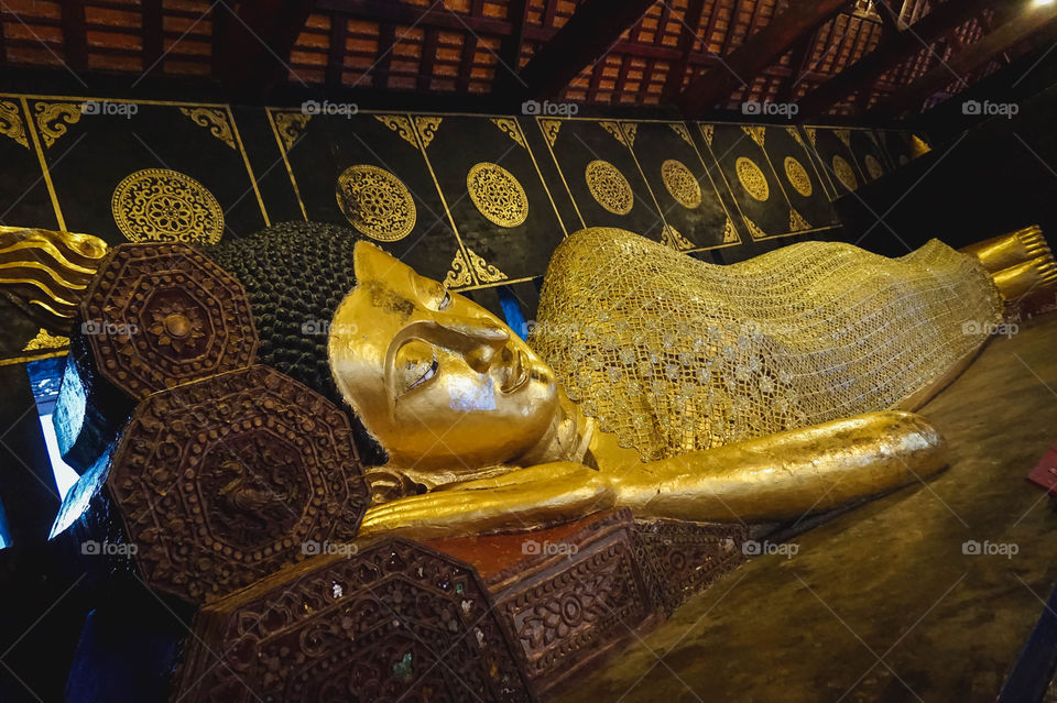 Big gold reclining Buddha in Chiang Mai, Thailand 