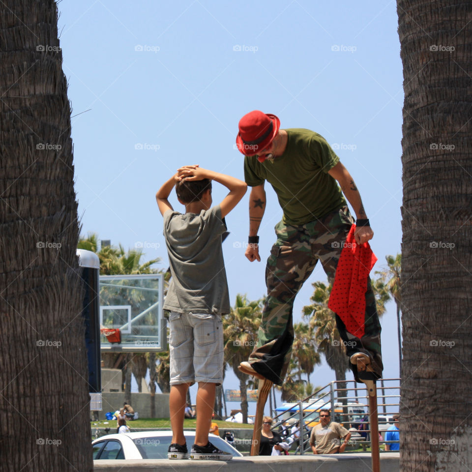 Venice Beach Clown and Boy Predicament. California. May 2009.