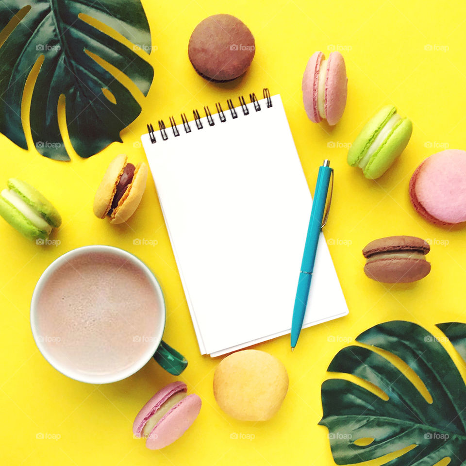 Summer flat lay. Coffee and macaroons