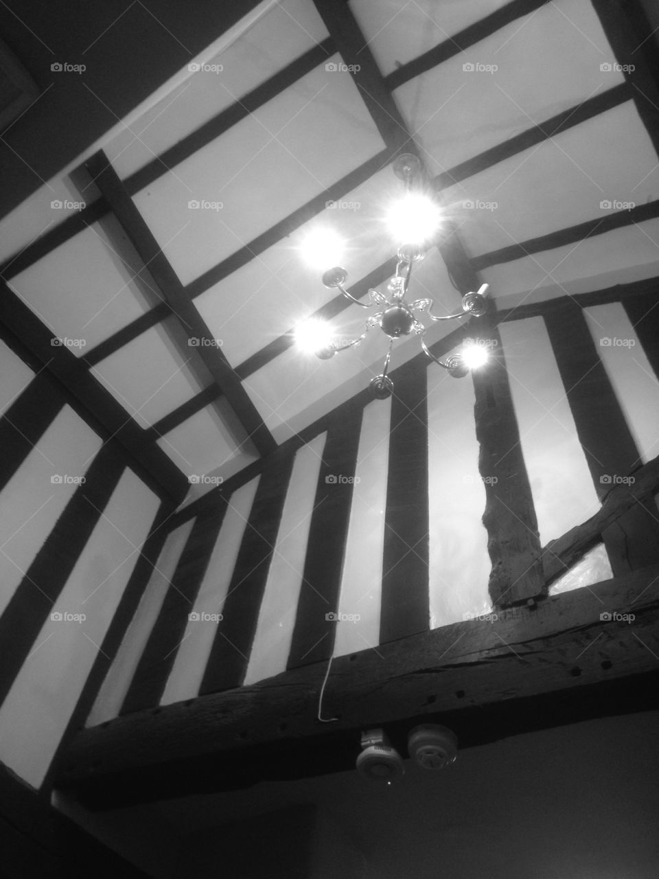 Looking up in the real house. Looking at the ceiling structure in an old house