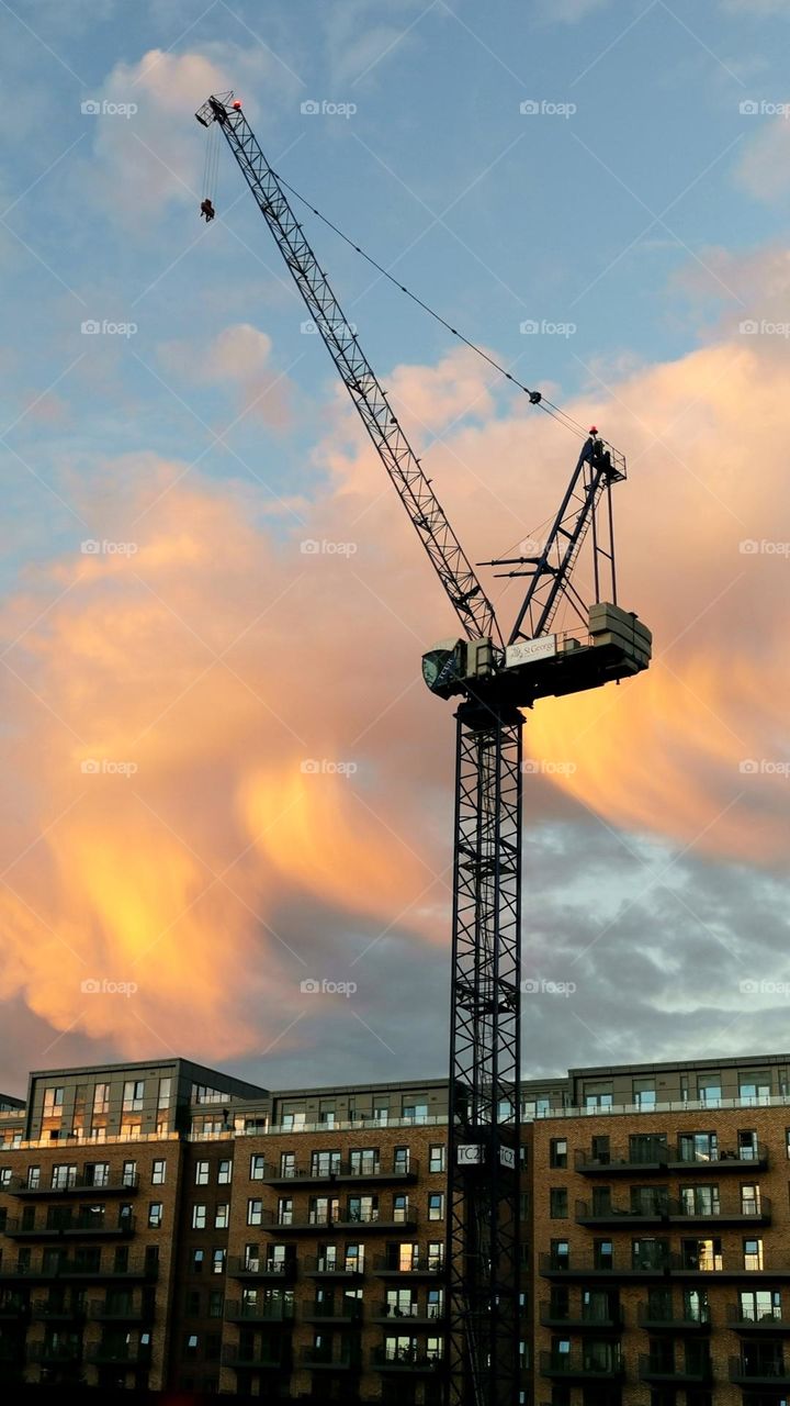 City. Beautiful sunset sky. Architecture. Buildings site.