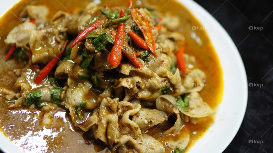this Thai food  was made from pork and spicy sauce called " Apirom sauce".
Apirom sauce is the new brand of Thai spicy sauce.  It is the taste of North eastern thailand food. Anyone can make this extremely delicious dish just using Apirom sauce. 