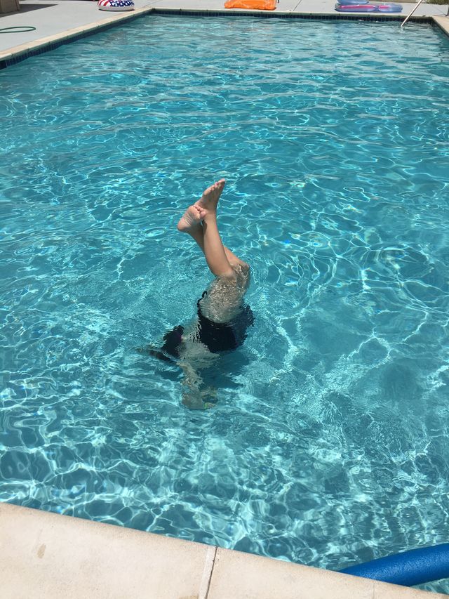 Underwater handstand