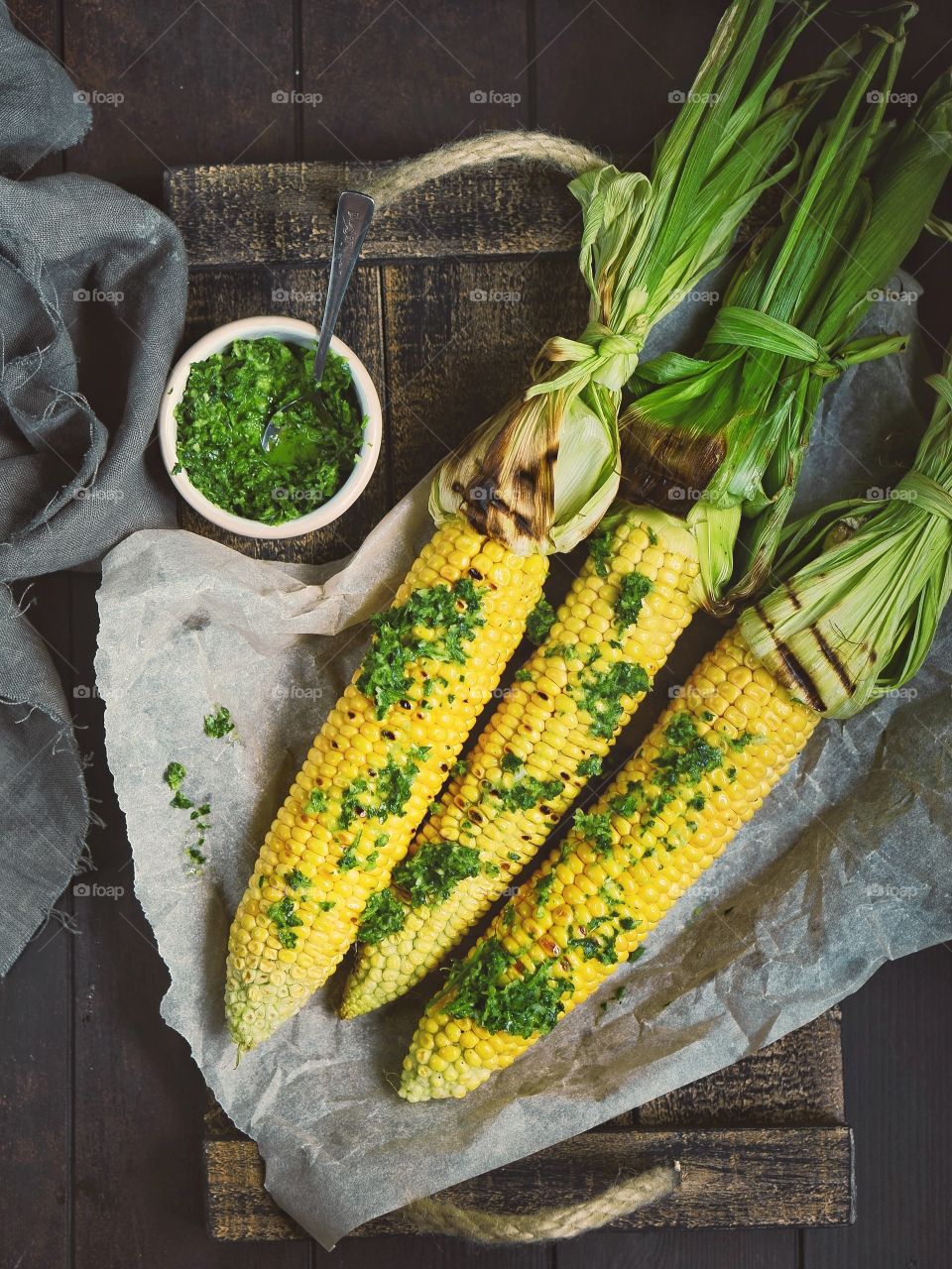 grilled corn with green sauce
