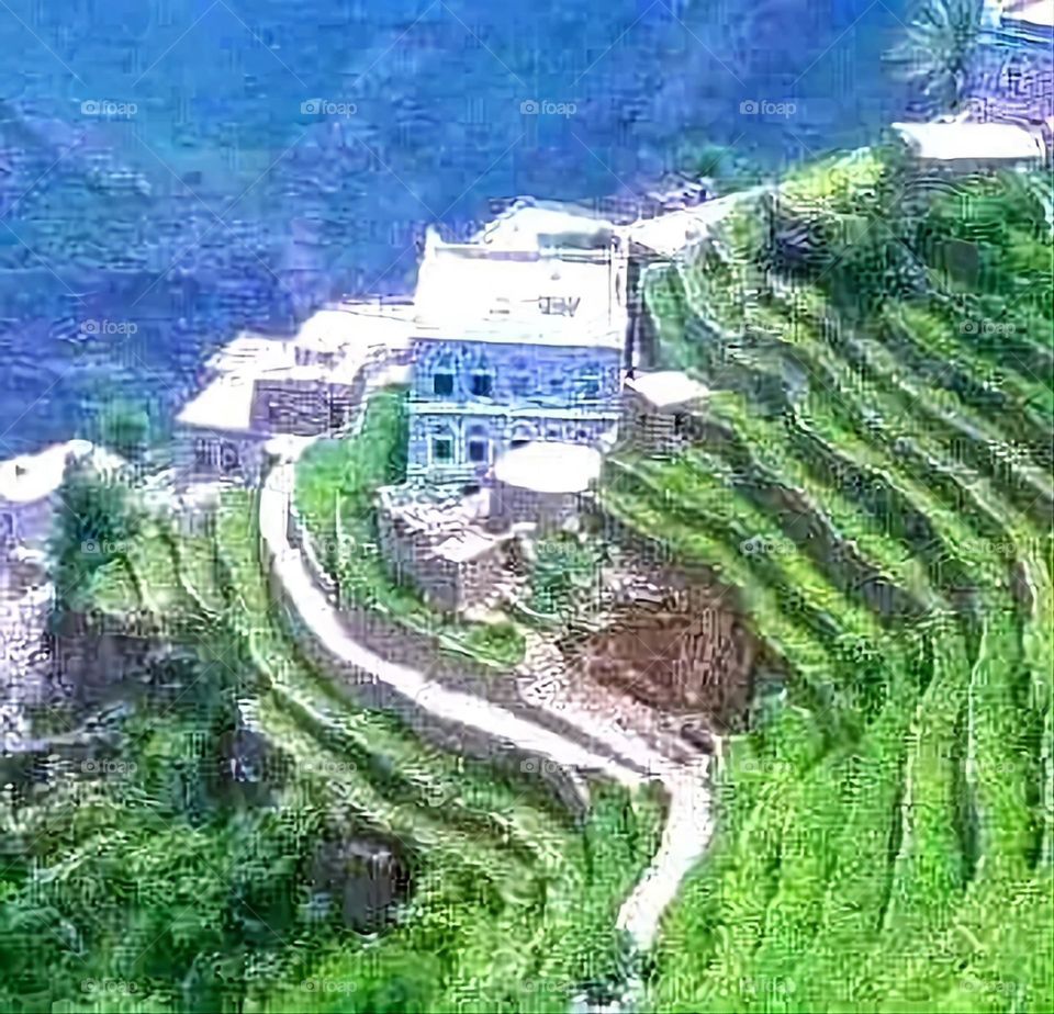 A stunning view of green mountains covered in fog in Yemen