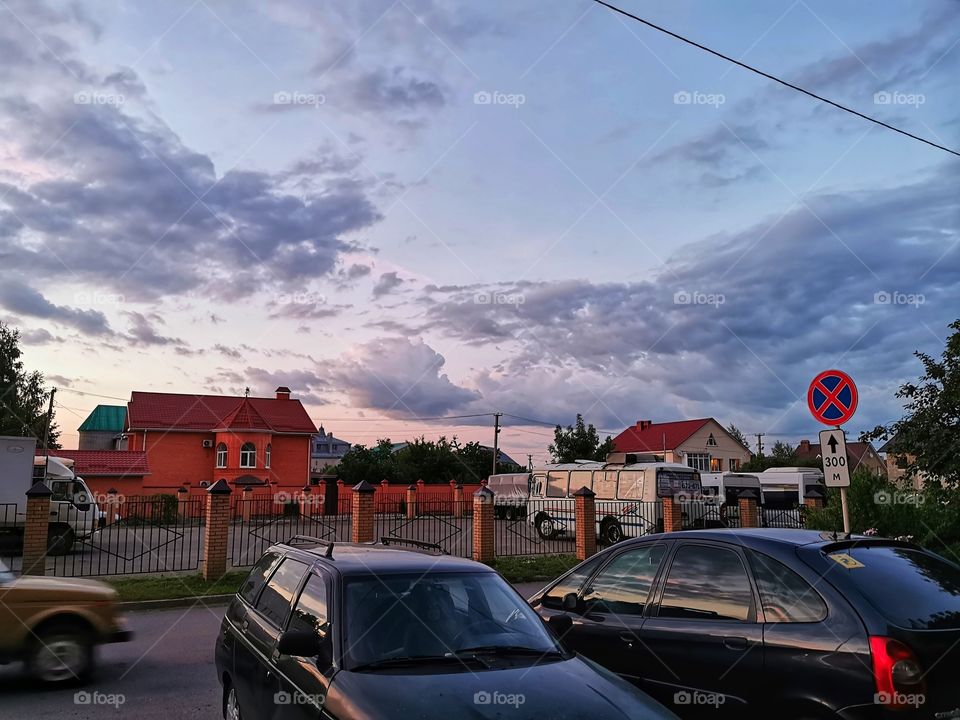 Sunset sky mood clouds moody nature greens wild outdoor outside joy happy car parking