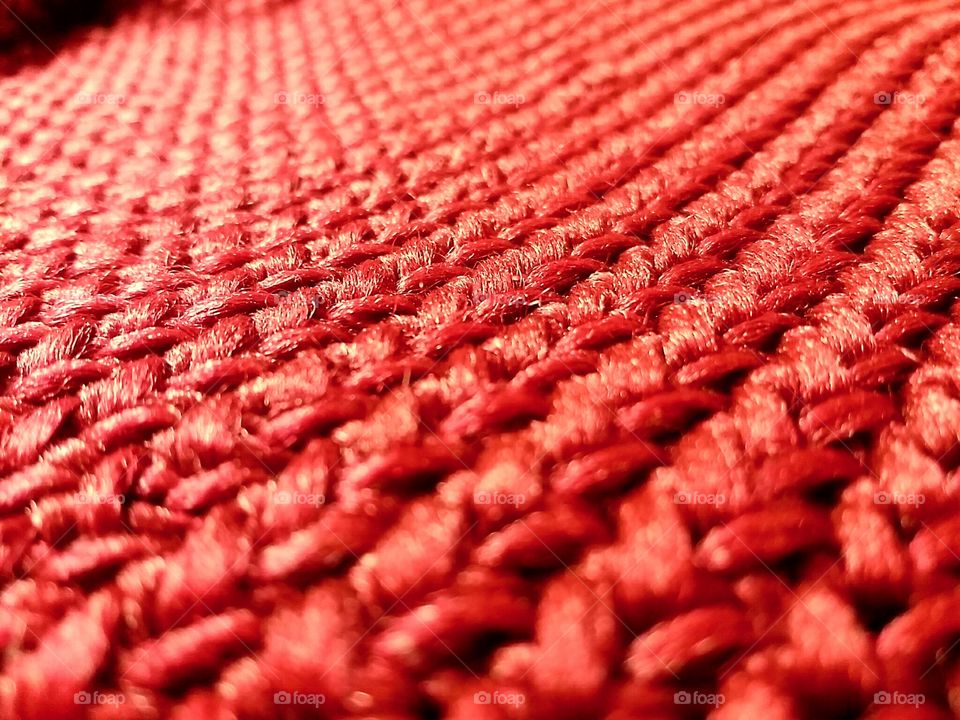 Extreme close-up of red wool