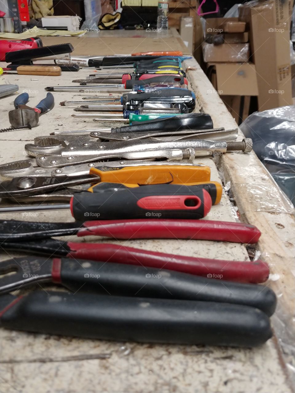 my boss used to keep his tools just like this. that made it easy to find them, easy to use them, and easy to put them away. i miss him and that job.