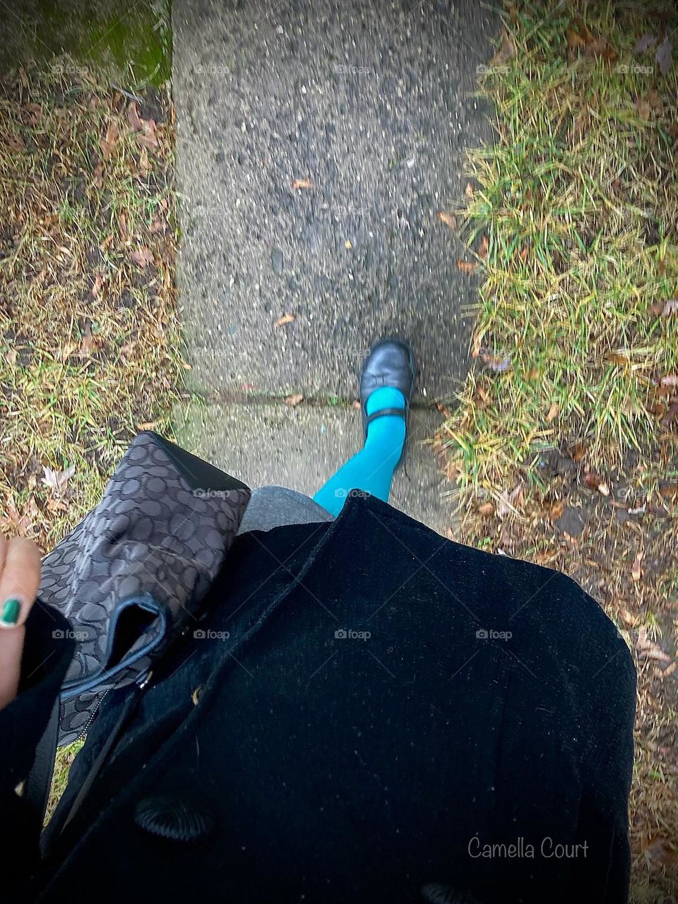 Walking on an old sidewalk behind a farmhouse
