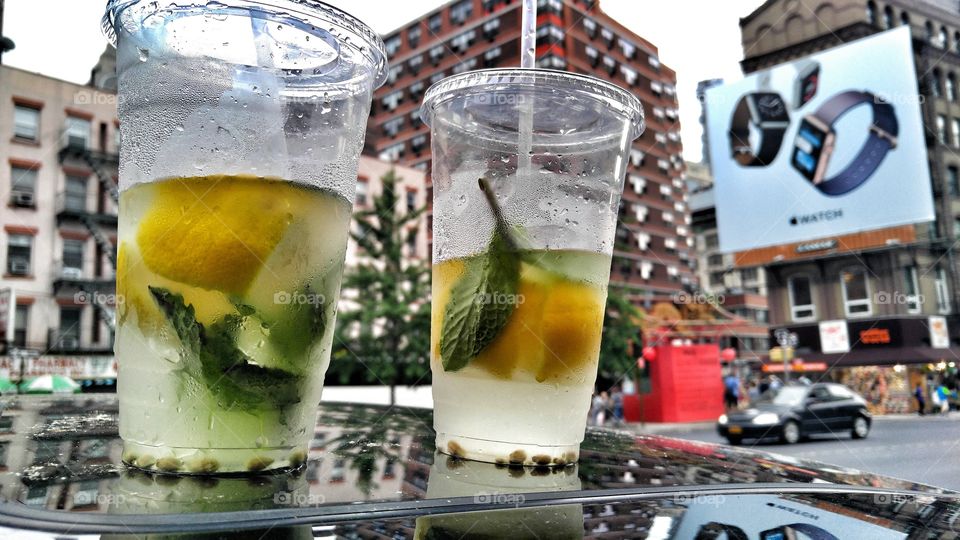 enjoying a fresh squeezed lemonade on the corner of China town and little Italy