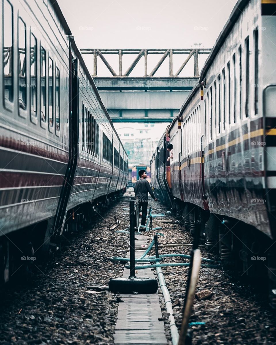 A Child and Train at Railway Station