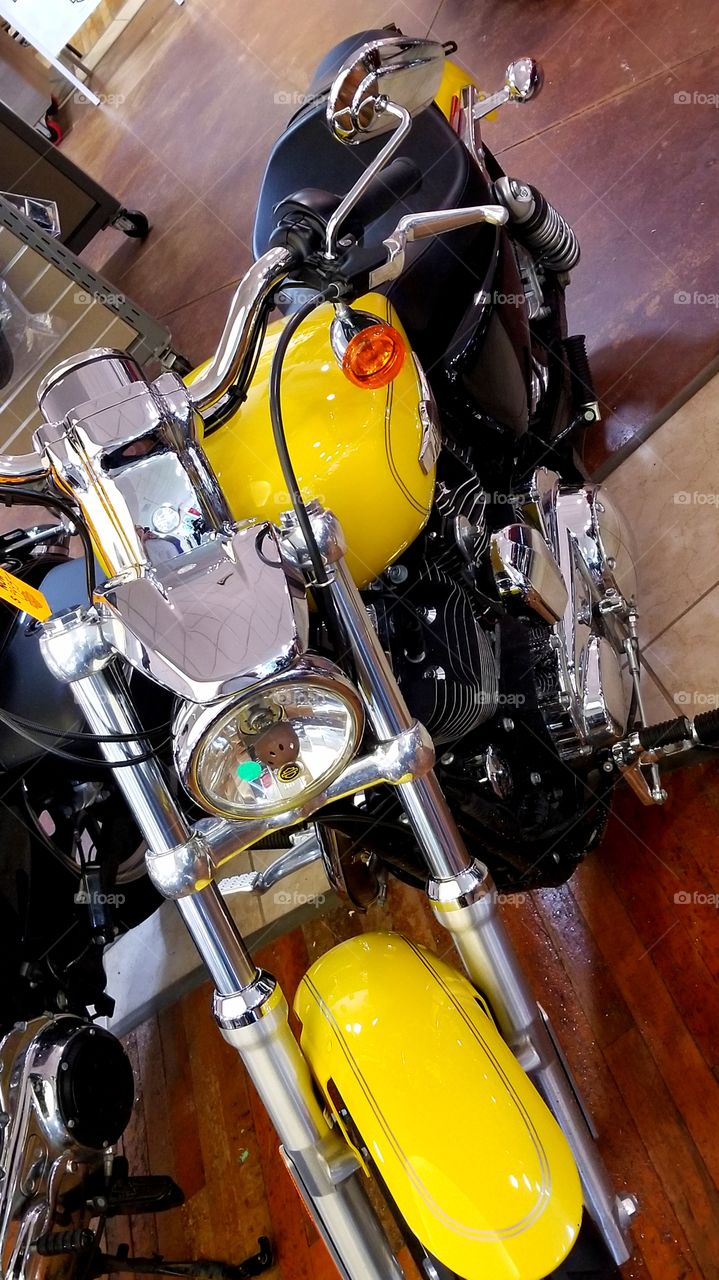 beautiful yellow Harley-Davidson all chromed out