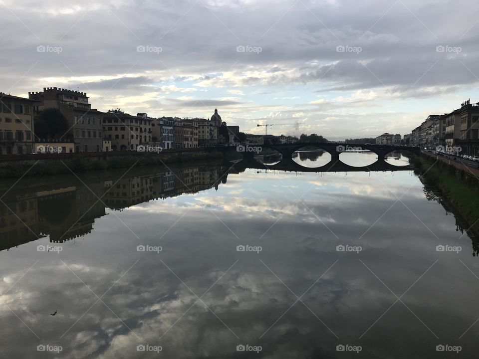 Arno river landscape in Florence on a cloudy, wintery day.