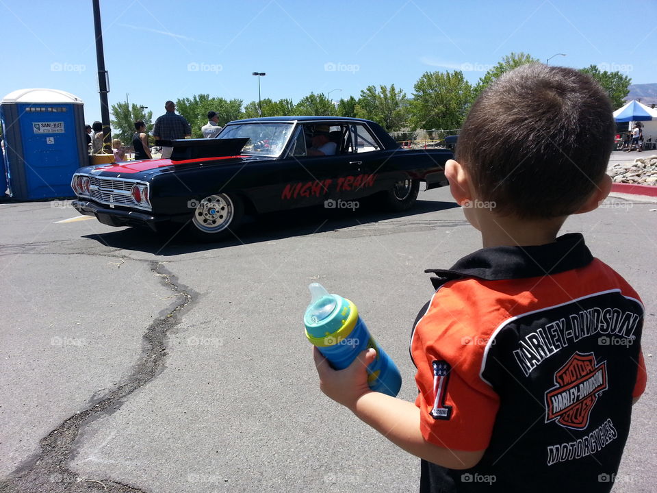 Classic Car Drag Race. my son watching the cars line up
