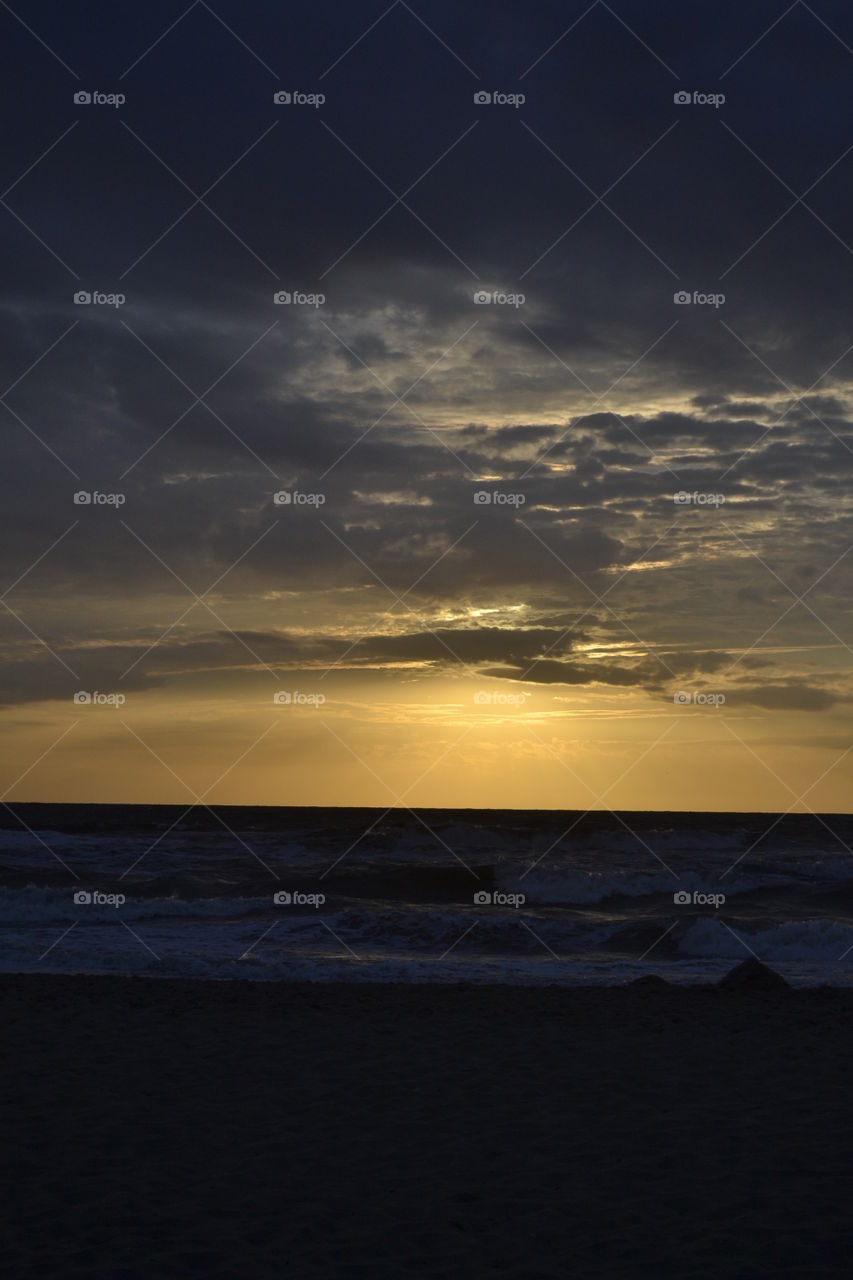 Clouds for the sun.. Taken in Holland.
