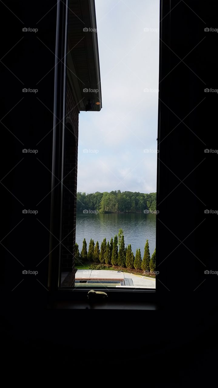 view from window looking at a lake