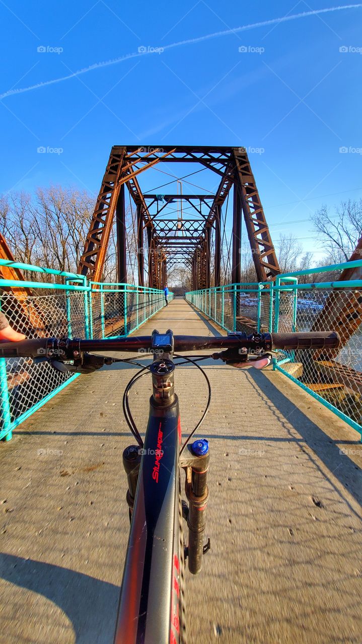 biking on bridge