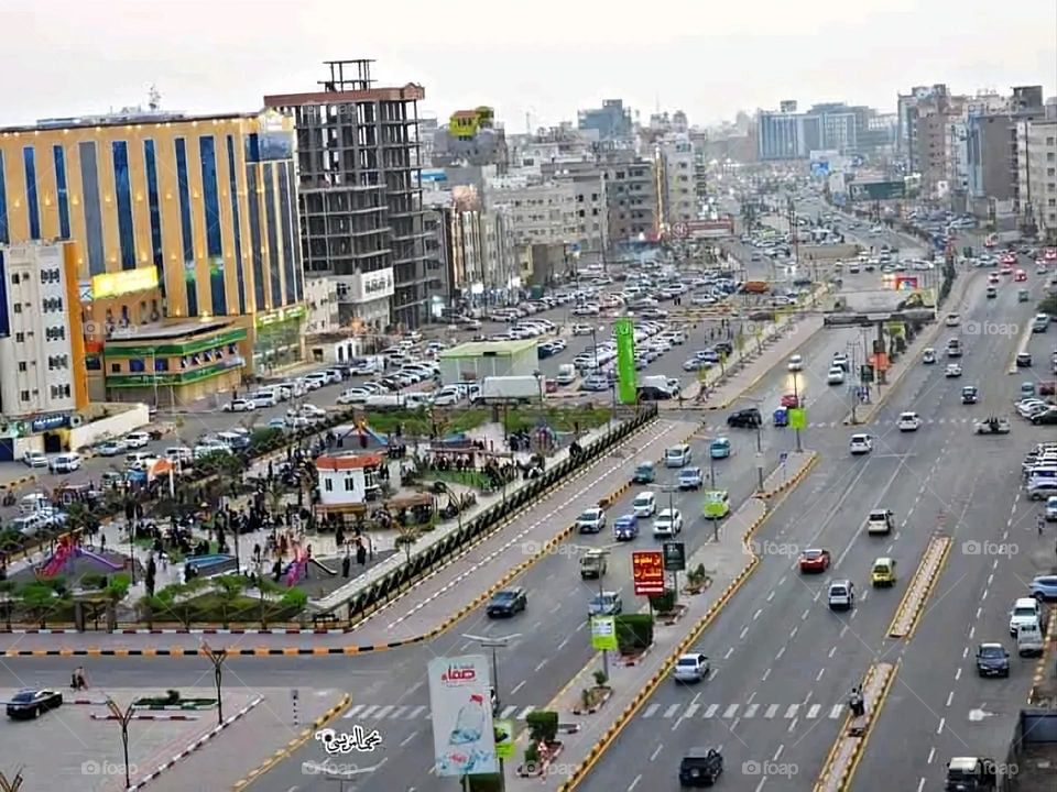 A very beautiful picture, and there is no better picture than it. There is no better picture of green herbs and colorful, red and white roses than it. Glory be to God, the natural and picturesque view, and there is no more