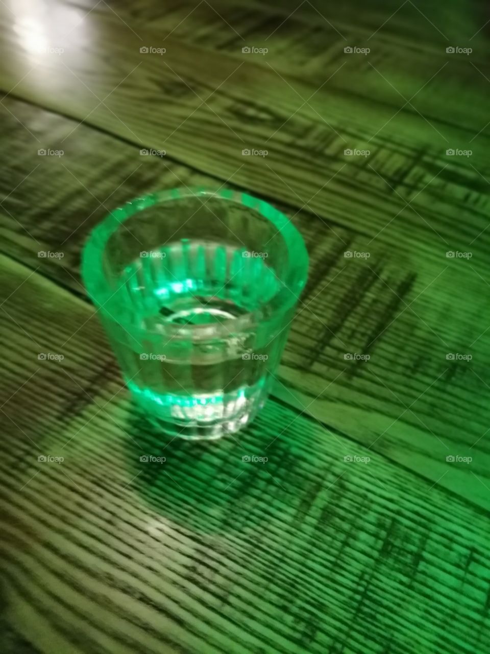 The bottom of a shot glass is a lonely place where so many people hang out, I hope to capture the solemn loneliness
