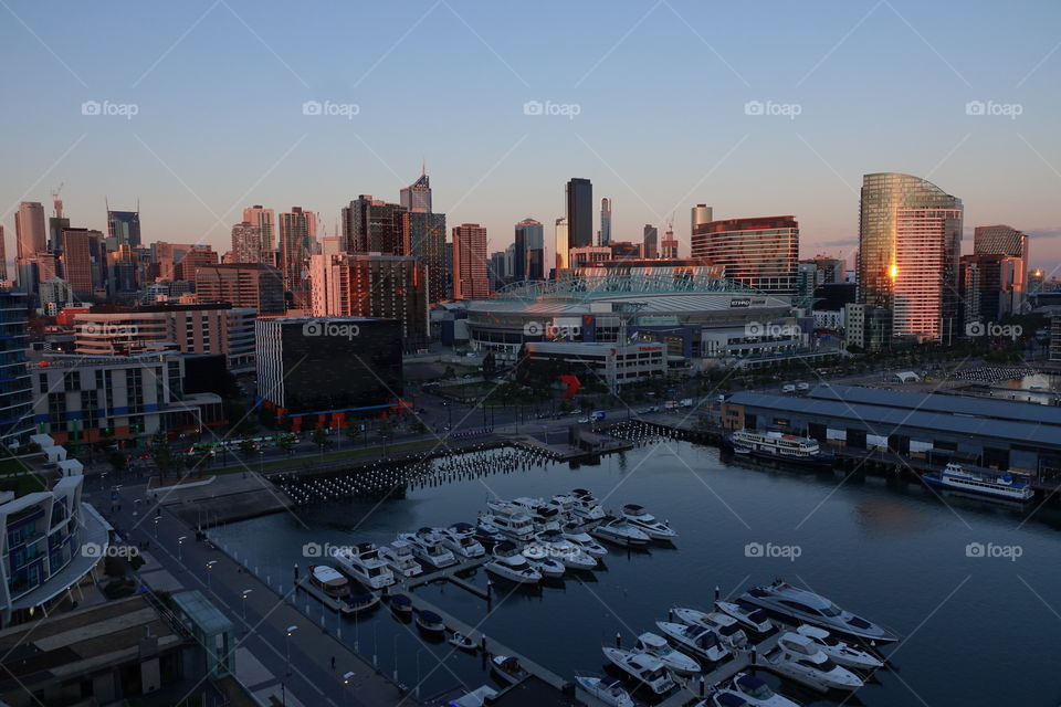 Beautiful sunset at the Victoria harbor and over downtown Melbourne.