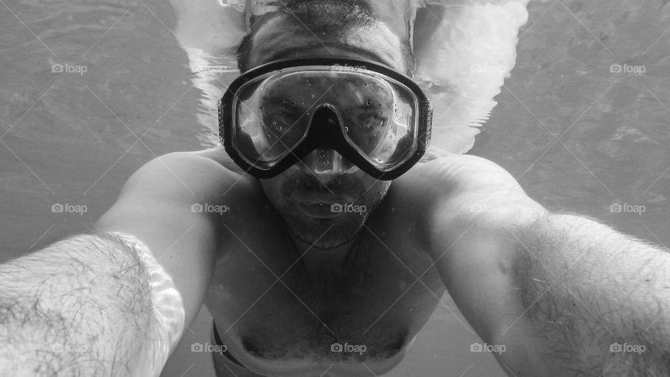 Portrait of man snorkeling underwater