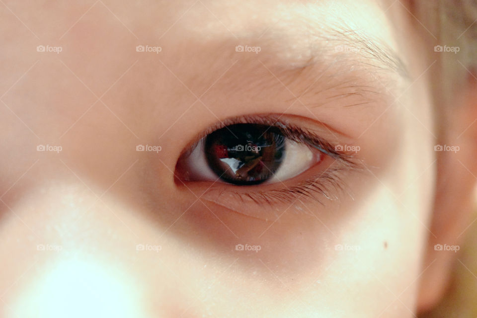 Mummy's reflection in her daughter's eyes. 