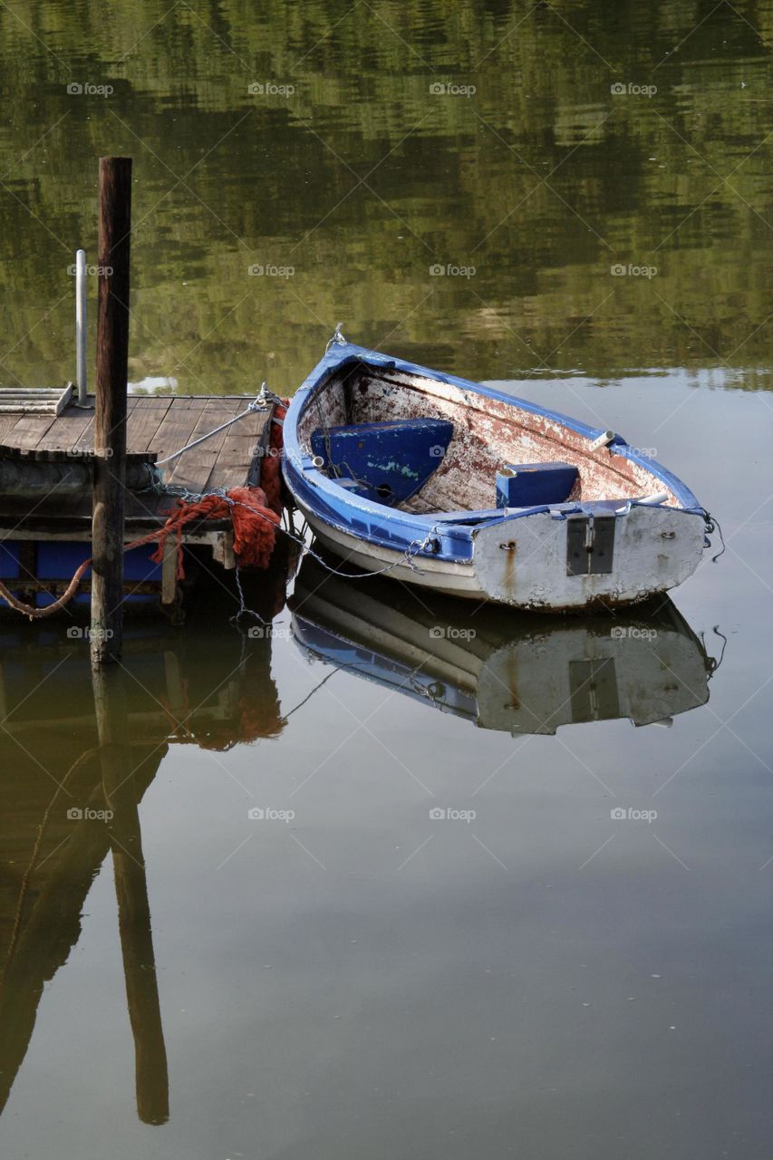Afloat - in the quiet waters of the Breede River, this boat awaits to set off.