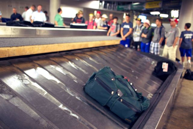 Baggage Claim. Bags on an airport turn style. 