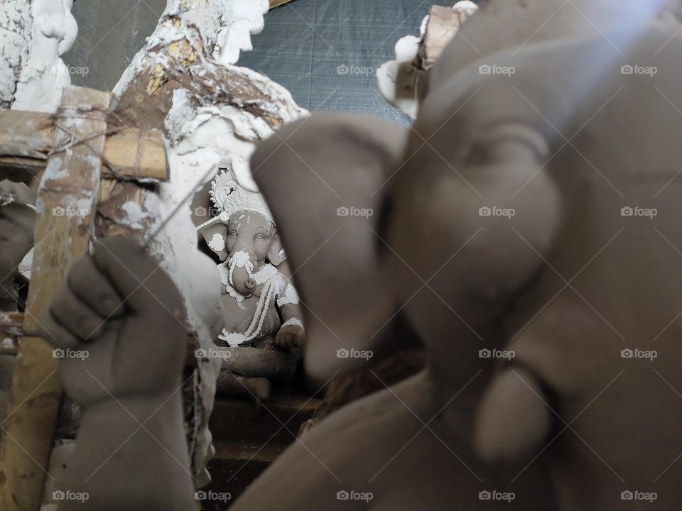 lord Ganesha idol making for Ganesh Utsav in India