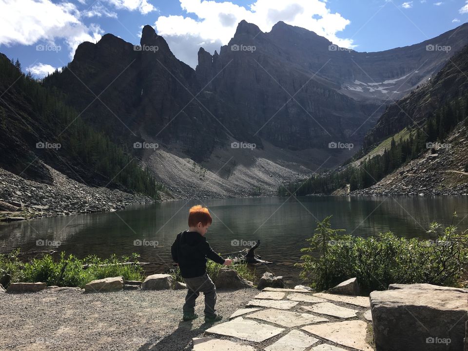 Toddler having a great time at the top of Lake Louise 