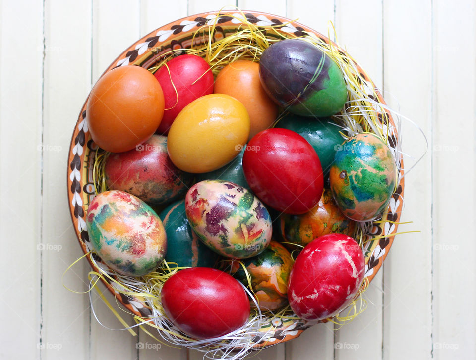 Colorful Easter eggs in a basket