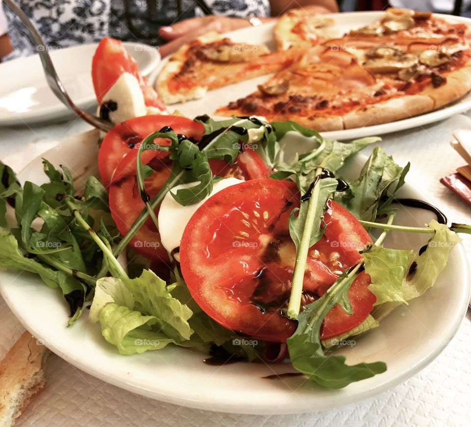Pizza and Caprese Salad in Italy 