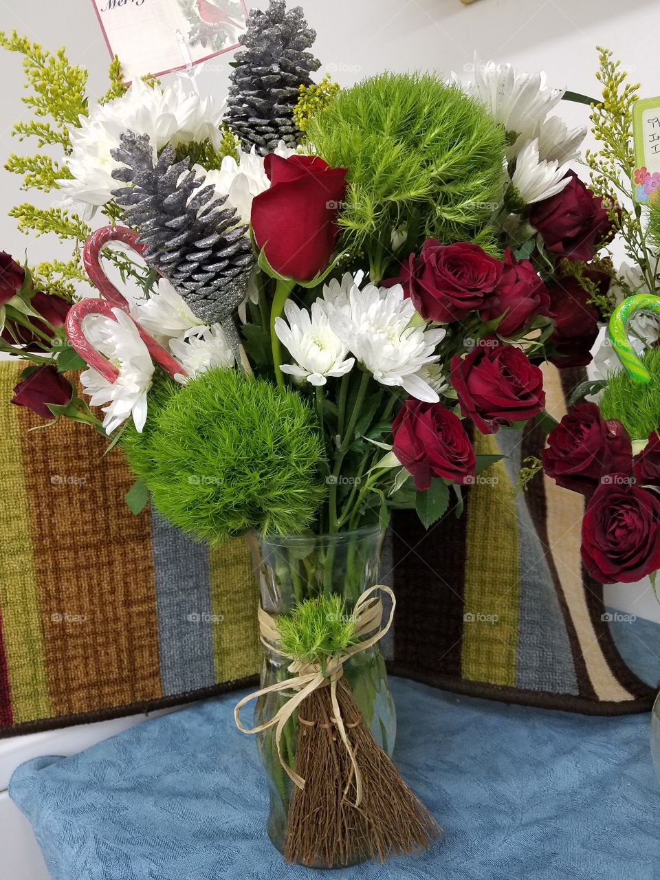 Beautiful flowers in vase setting Christmas spirits cheerful decorations