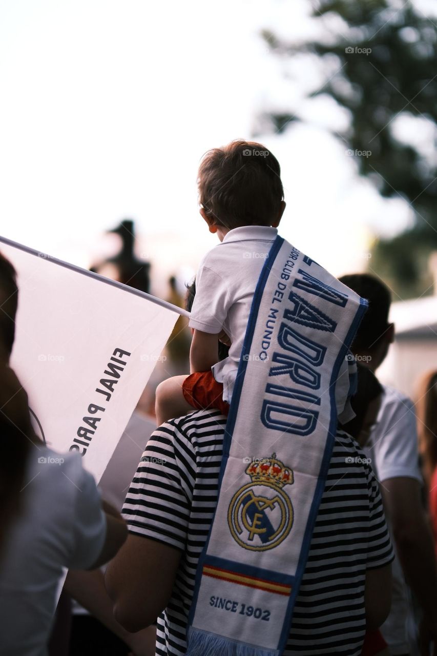 Little boy enjoying the triumph of Real Madrid 