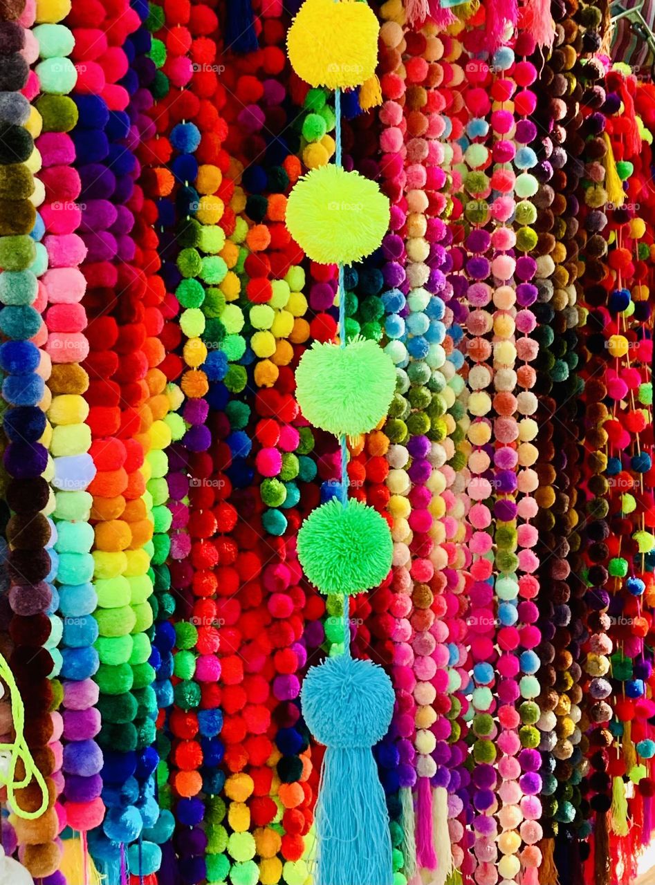 Colourful Mexican Pompoms at the market.