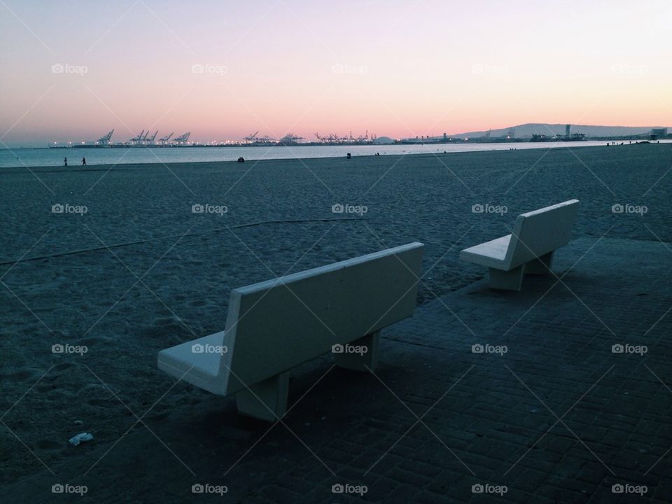 Two benches on beach