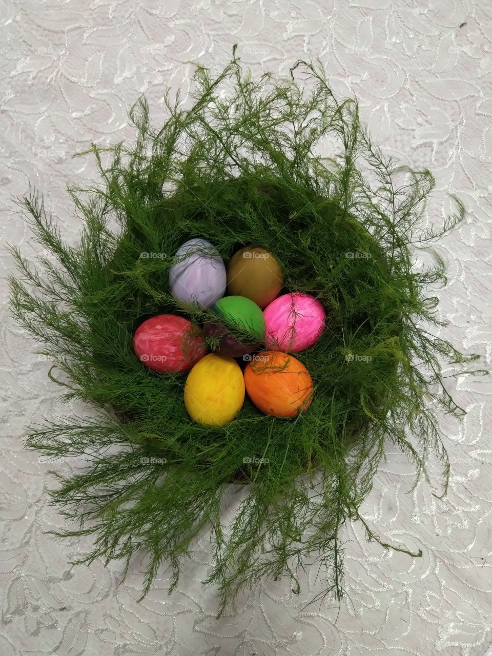 a  green nest with  easter egg