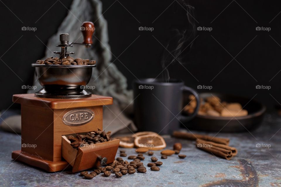 Cup of coffee with coffee beans 