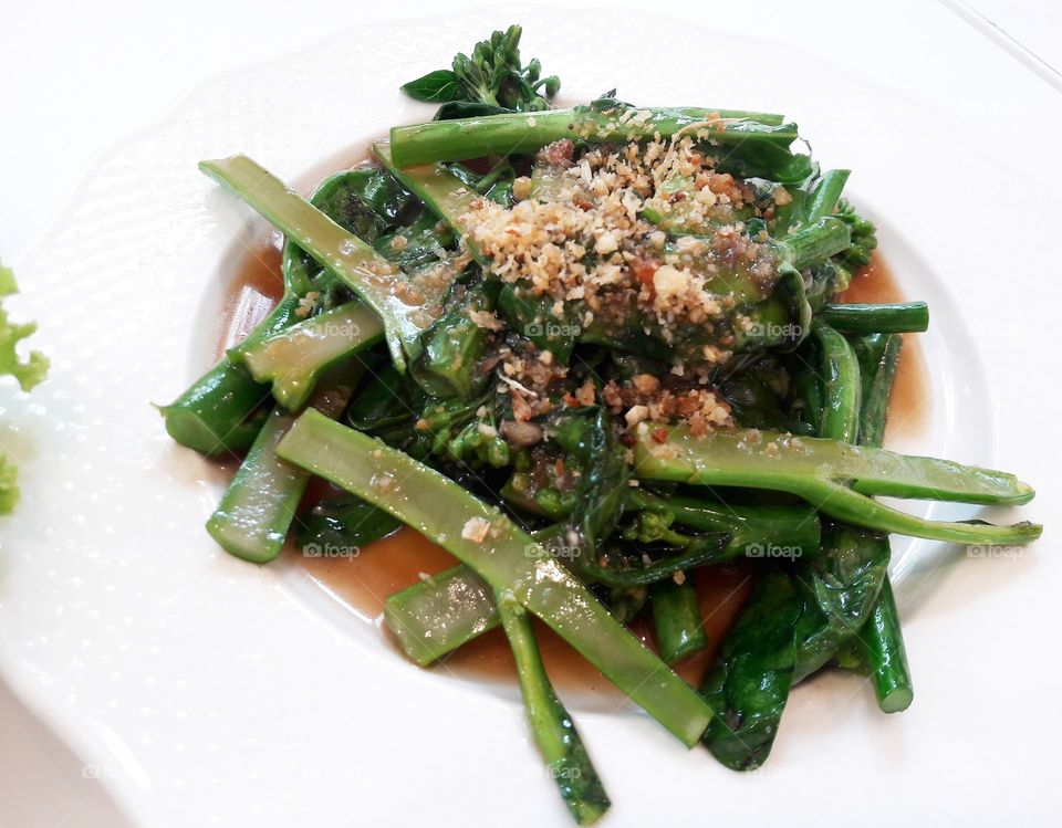 Fried kale with oyster sauce.