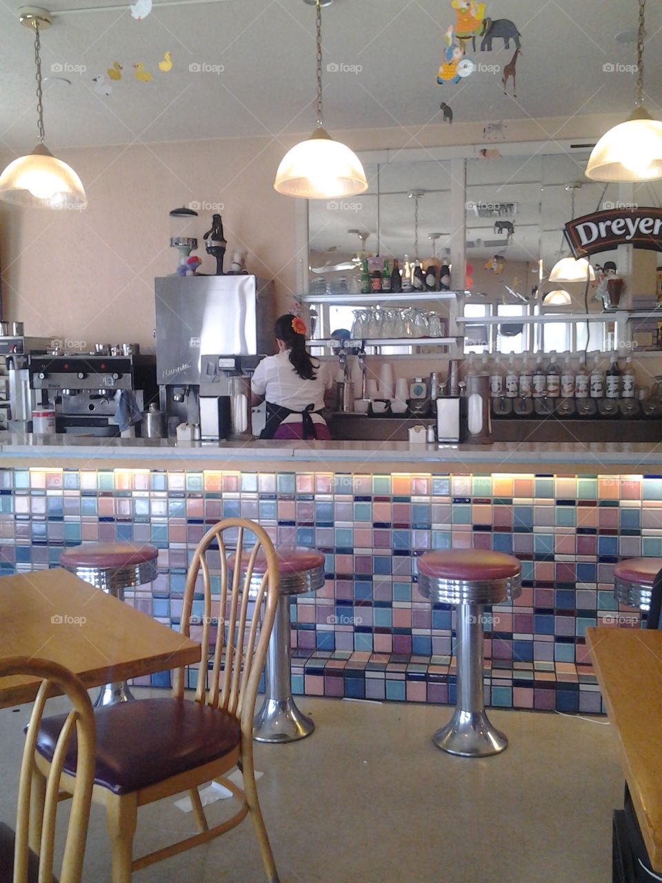 Waitress Makes a Tonic in a Classic Soda Shop. Albuquerque, New Mexico.