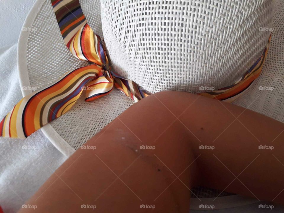 hat with a colour bow