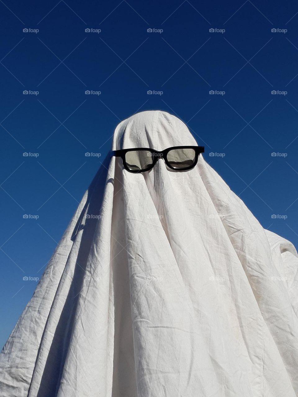 Halloween image on a blue sky background
