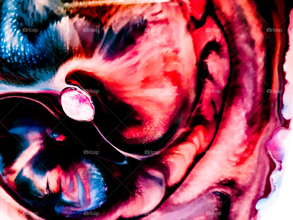 Clash of colours. I created this colourful soft, flowing, dynamic, three dimensional abstract using stones, marbles, oil, food dye, glue, water, dish soap and a small paint brush. Fun!!!