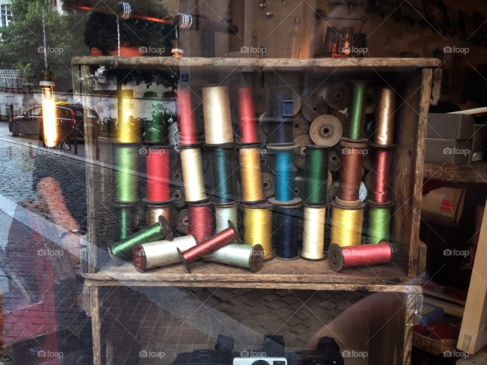 French shop with colorful threads 