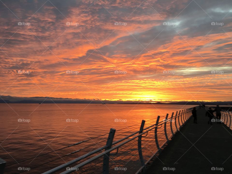 Red sky reflecting into the ocean