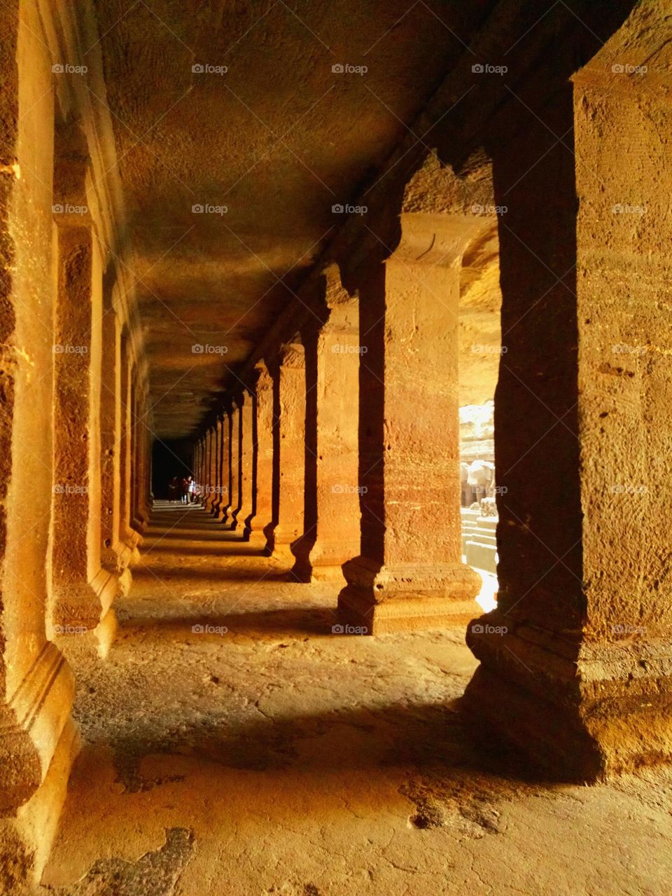 Ellora  - Rock cut - pillars - Suns shade