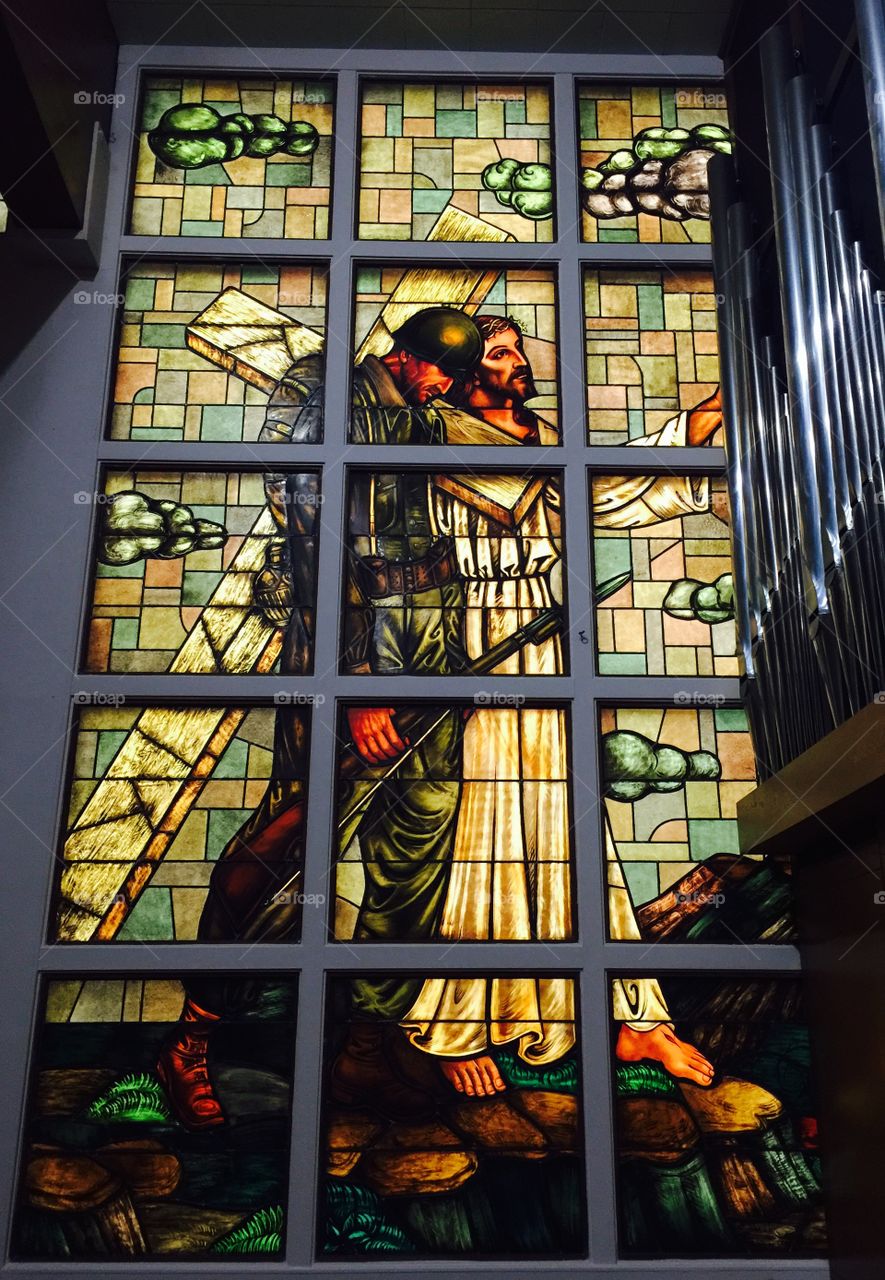 Stained Glass of Jesus guiding a Soldier