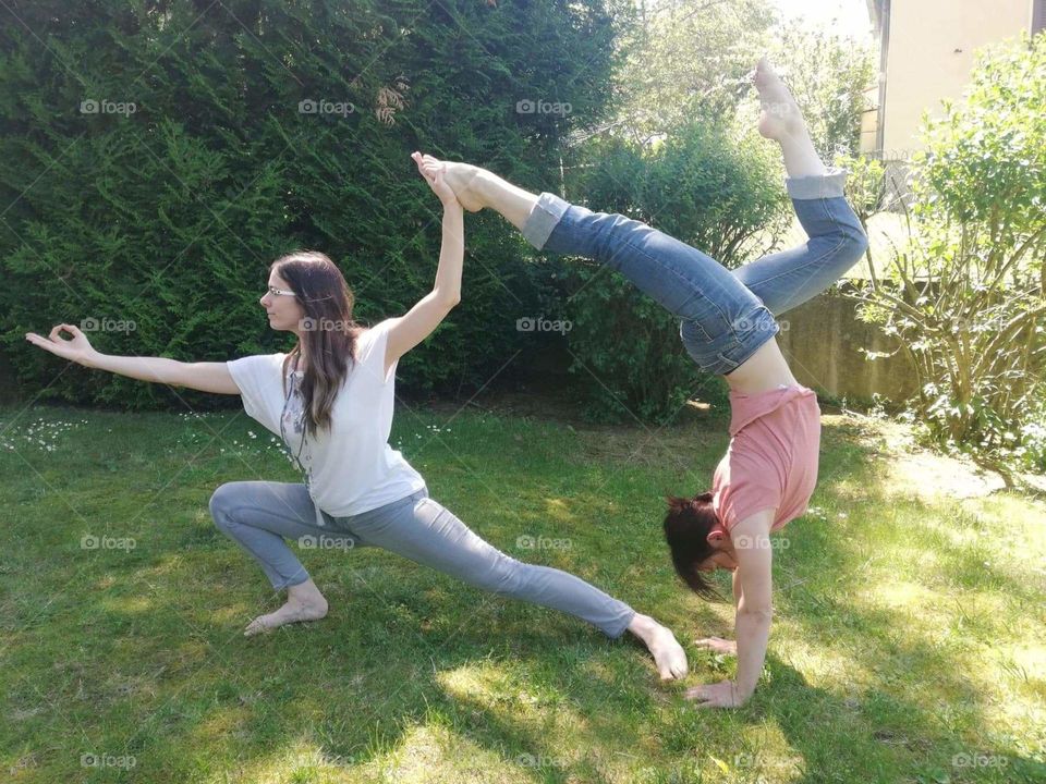 Girls doing yoga in the garden