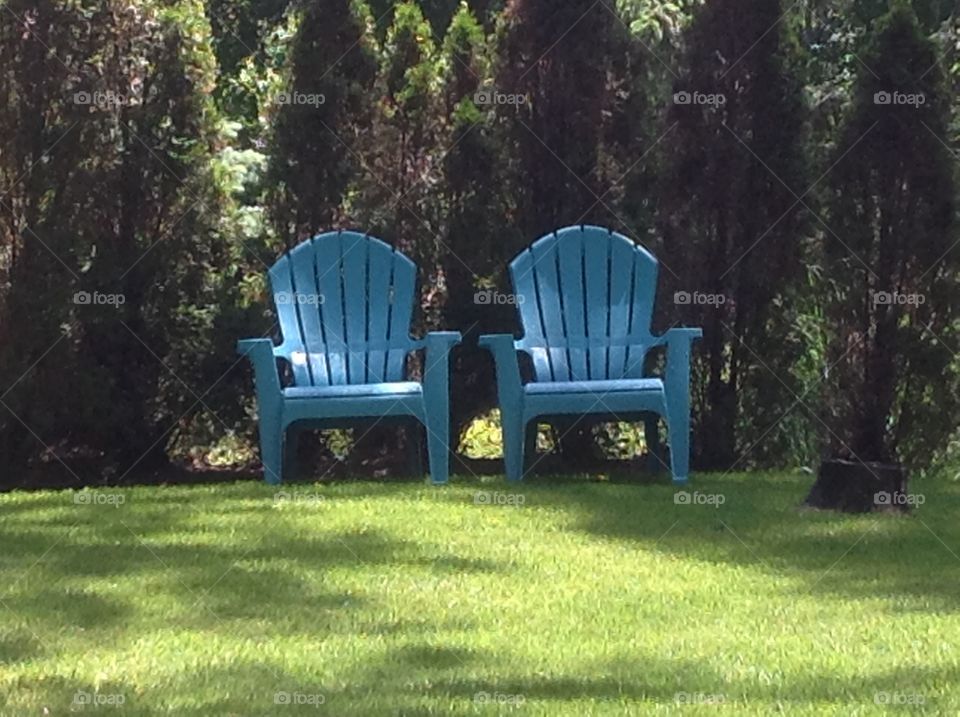 Two Adirondack chairs.