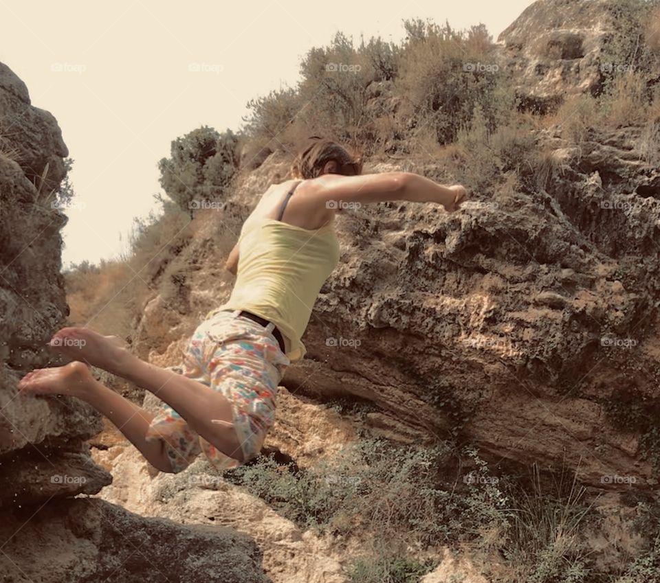 In the middle of nature practicing jumping into the water. The water was very cold but the experience was worth it.